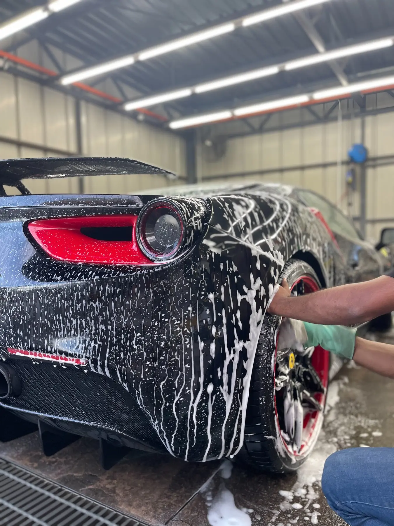 Ferrari receiving a premium hand wash at WG Detailing