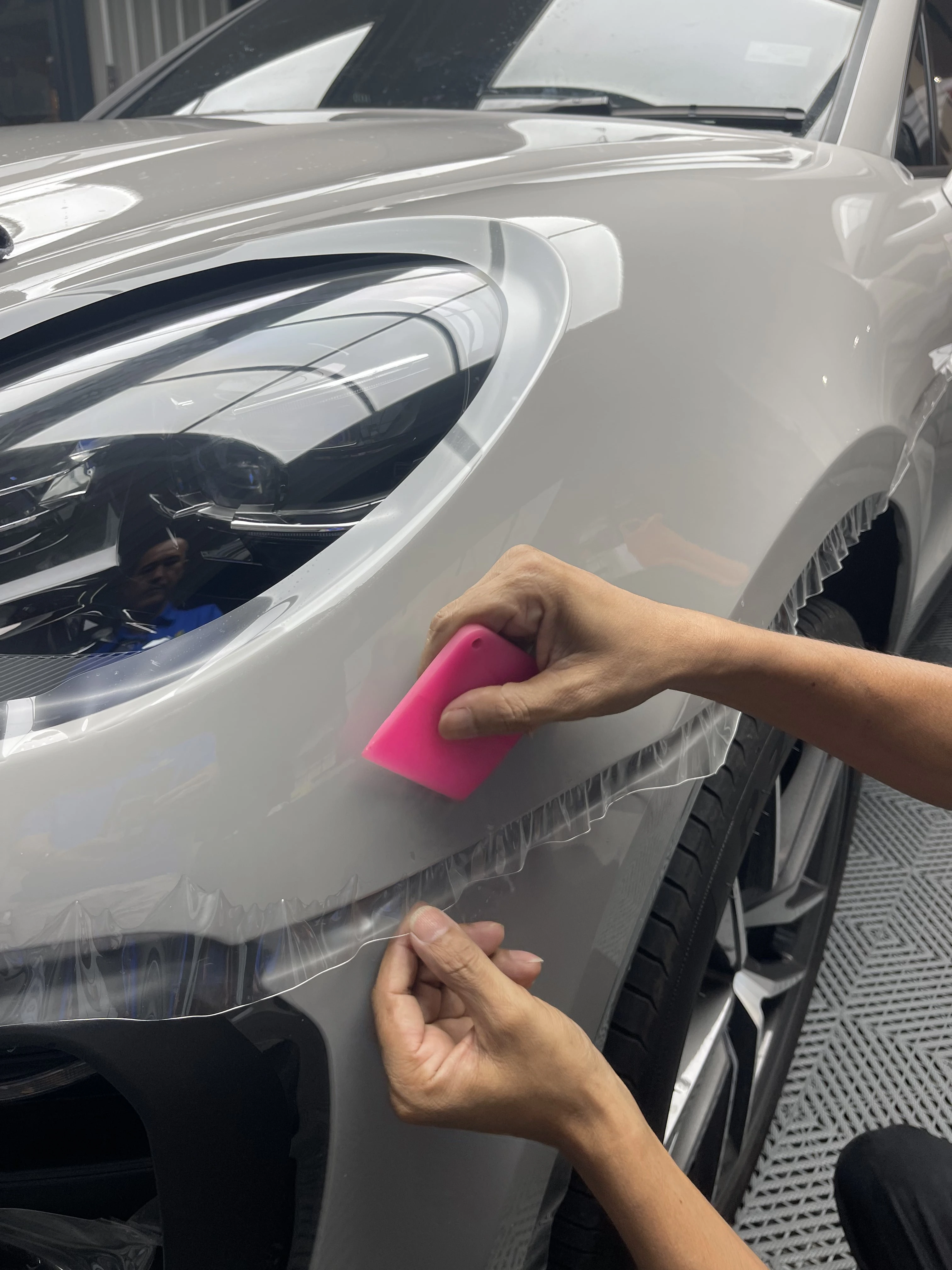 Paint protection film being installed at WG Detailing